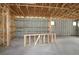 Interior view showing a new construction home showcasing a concrete floor, wooden framing, windows, and utilities at 3110 19Th N St, St Petersburg, FL 33713