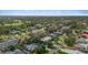 An aerial view of a residential neighborhood, boasting lush greenery and well-maintained lawns at 3235 Walnut Ne St, St Petersburg, FL 33704