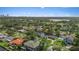 A suburban home with a lush landscape, golf course and lake views, offering a serene and active lifestyle at 3235 Walnut Ne St, St Petersburg, FL 33704