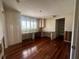 Bedroom with built-in cabinets, natural light, and hardwood flooring at 3235 Walnut Ne St, St Petersburg, FL 33704