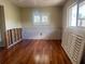 Bedroom with hardwood floors, natural light and window shutters at 3235 Walnut Ne St, St Petersburg, FL 33704