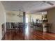Spacious living room with hardwood floors, dining area, and kitchen view at 3235 Walnut Ne St, St Petersburg, FL 33704