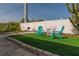 Landscaped backyard featuring well maintained lawn, patio area and privacy fence at 3301 Alt 19 # 819, Palm Harbor, FL 34683
