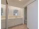 Bathroom with vanity, sink, toilet, and enclosed shower at 3301 Alt 19 # 819, Palm Harbor, FL 34683