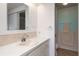 Bathroom with vanity, sink, and tiled shower at 3301 Alt 19 # 819, Palm Harbor, FL 34683