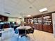 This library features floor to ceiling bookshelves, tables with chairs, and is ready for a peaceful reading at 3301 Alt 19 # 819, Palm Harbor, FL 34683