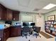 This community office features multiple computer stations, cabinetry, and is ready for community members to connect at 3301 Alt 19 # 819, Palm Harbor, FL 34683