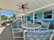 Community patio with lots of tables and chairs for residents to gather and socialize with each other at 3301 Alt 19 # 819, Palm Harbor, FL 34683