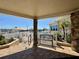 From the covered porch, the view looks out to the community pool and ample seating available to relax at 3301 Alt 19 # 819, Palm Harbor, FL 34683