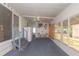 Bright sunroom with a ceiling fan and ample windows leading to the outdoors at 3301 Alt 19 # 819, Palm Harbor, FL 34683