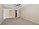Well-lit bedroom features an ensuite bathroom and closet space, offering ample space and convenience at 3389 Crystal E Ct # J, Palm Harbor, FL 34685