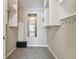 Walk-in closet with built-in shelving and a mirror, providing ample storage space for clothes and accessories at 3389 Crystal E Ct # J, Palm Harbor, FL 34685