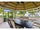 Interior view of the community gazebo featuring a table and chairs at 3389 Crystal E Ct # J, Palm Harbor, FL 34685