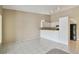 Compact kitchen area with white cabinets, and black appliances at 3389 Crystal E Ct # J, Palm Harbor, FL 34685