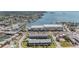 A beautiful aerial view showing a waterfront location, community, and local attractions at 340 Causeway Blvd # 105, Dunedin, FL 34698
