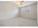 Bright bedroom features new carpet and an airy window at 340 Causeway Blvd # 105, Dunedin, FL 34698
