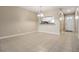 The spacious living area is bathed in natural light, offering a welcoming ambiance for relaxation and entertaining at 340 Causeway Blvd # 105, Dunedin, FL 34698