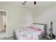 Bright bedroom features a large window and exercise equipment set at 34447 Windknob Ct, Wesley Chapel, FL 33545