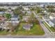 Aerial view of a property with a spacious green yard and an outlining red border at 4001 W Carmen St, Tampa, FL 33609