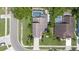 Overhead shot of house with mature landscaping, well manicured lawn and circular driveway at 4047 Eagle Cove West Dr, Palm Harbor, FL 34685