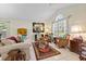 Inviting living room with large windows and comfortable seating at 4047 Eagle Cove West Dr, Palm Harbor, FL 34685