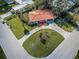 Aerial view of the home showcasing its location, lot, and neighborhood at 431 Windward Psge, Clearwater Beach, FL 33767