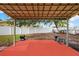 Spacious backyard featuring a covered patio space perfect for enjoying the outdoors at 431 Windward Psge, Clearwater Beach, FL 33767