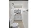 Bathroom features a vanity with granite countertop, modern fixtures, and updated design at 431 Windward Psge, Clearwater Beach, FL 33767