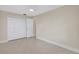 Neutral bedroom with ceiling fan, closet, and light-colored floor at 431 Windward Psge, Clearwater Beach, FL 33767
