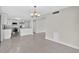 Open concept living room and kitchen with bright natural light at 431 Windward Psge, Clearwater Beach, FL 33767