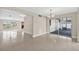 Open-concept living room with lots of natural light, sliding glass doors to the patio, and plenty of space at 431 Windward Psge, Clearwater Beach, FL 33767