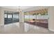 Sunroom leading to patio and large backyard at 431 Windward Psge, Clearwater Beach, FL 33767