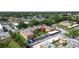 Aerial view of the complex, nearby retail stores, and easy access to roads at 4500 E Bay Dr # 106, Clearwater, FL 33764