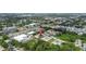 Aerial view of complex, showcasing landscaping, building and surrounding neighborhood at 4500 E Bay Dr # 106, Clearwater, FL 33764