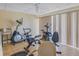 Well-lit exercise room with an assortment of equipment for residents' fitness needs at 4500 E Bay Dr # 106, Clearwater, FL 33764