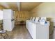Bright laundry room with multiple washers and dryers for community use at 4500 E Bay Dr # 106, Clearwater, FL 33764