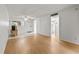 Spacious living room with tile and laminate flooring, ceiling fan and bright neutral walls at 4500 E Bay Dr # 106, Clearwater, FL 33764