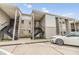 Exterior view of a residential building featuring well-maintained landscaping and convenient parking spaces at 4513 S Oak Dr # Q21, Tampa, FL 33611