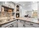 This kitchen features granite countertops, stainless appliances, and plenty of storage at 4513 S Oak Dr # Q21, Tampa, FL 33611