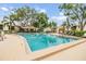 An inviting community pool with a gazebo and lounge chairs, providing a perfect retreat for residents at 4513 S Oak Dr # Q21, Tampa, FL 33611