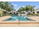 The community pool offers a refreshing escape, complete with comfortable lounge chairs and lush surroundings at 4513 S Oak Dr # Q21, Tampa, FL 33611
