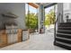 Luxurious outdoor kitchen with modern appliances, grill, and access to seating and the pool at 4806 W Euclid Ave, Tampa, FL 33629