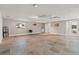 Spacious bonus room with tile flooring, recessed lighting, and a door leading to the outdoor area at 4931 Pelican Dr, New Port Richey, FL 34652