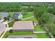 A serene backyard complete with a well-kept lawn and white fencing for added privacy at 5013 119Th E Ter, Parrish, FL 34219