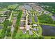 A property located in a peaceful neighborhood near a scenic pond at 5013 119Th E Ter, Parrish, FL 34219