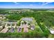 A well-maintained property nestled in a tranquil neighborhood setting with lush greenery and mature trees at 5013 119Th E Ter, Parrish, FL 34219