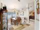 Cozy dining room area adjacent to living room with large window at 5013 119Th E Ter, Parrish, FL 34219
