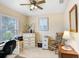 Bright home office space with a large window and ceiling fan at 5013 119Th E Ter, Parrish, FL 34219