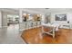 Open concept kitchen seamlessly flowing into the dining and living areas at 5657 Oceanic Rd, Holiday, FL 34690