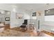 Stylish loft with wood floors, modern furniture, and decor at 5657 Oceanic Rd, Holiday, FL 34690